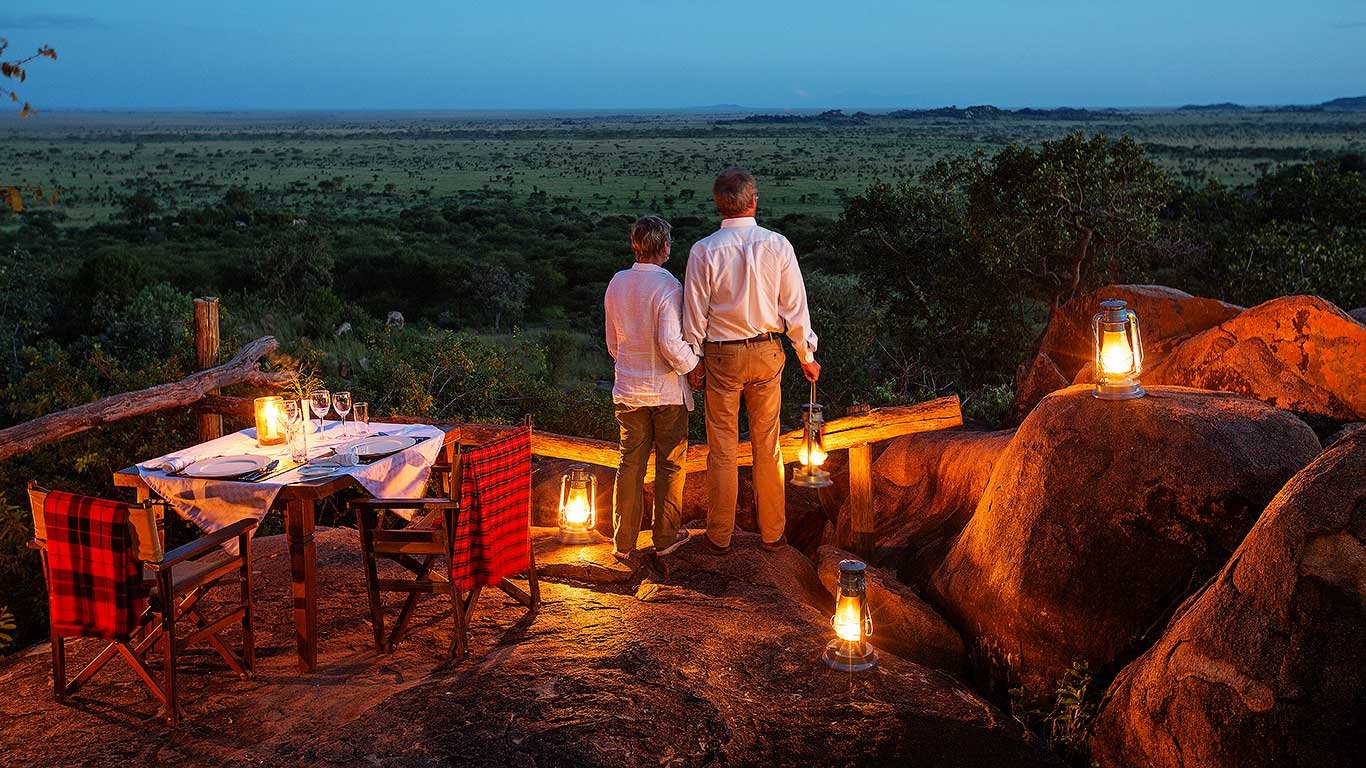Serengeti Pioneer Camp activities private dinner overlooking the savannah